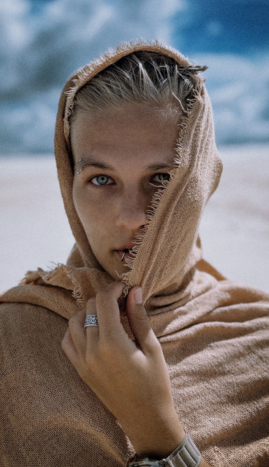 Portrait of Daria wearing a textured scarf